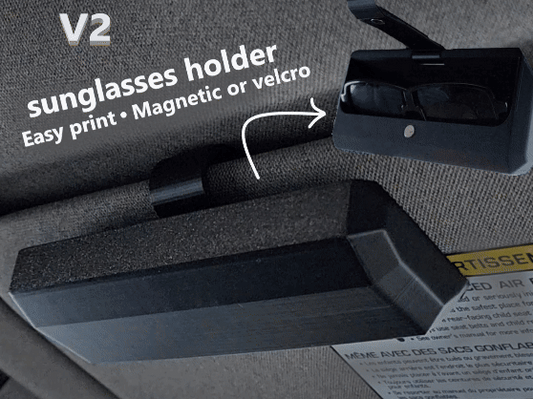 مشبك لحفظ النظارات الشمسية على مظلة السيارة